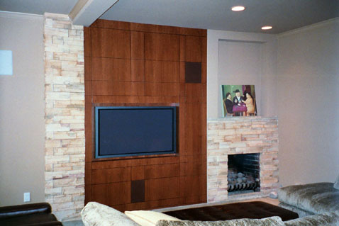ThisAmerican Cherry wall unit houses a full line of high end audio 
